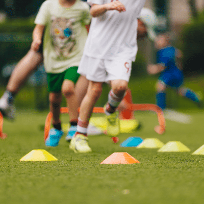Kids playing outside, representing sports injuries